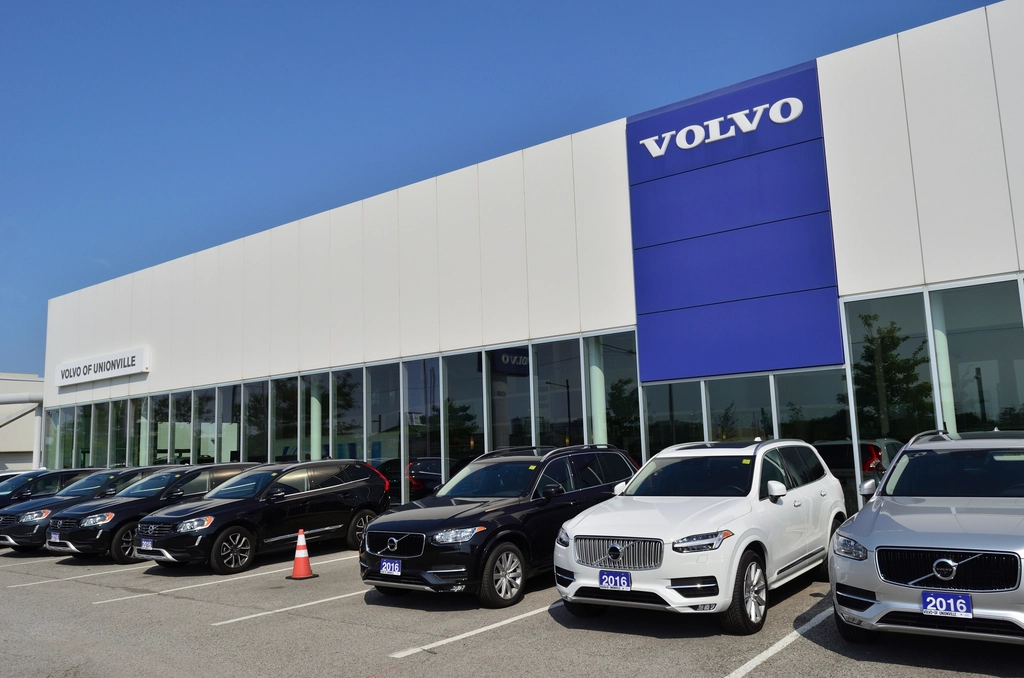 Complete Car Buying Guide Car dealership showroom